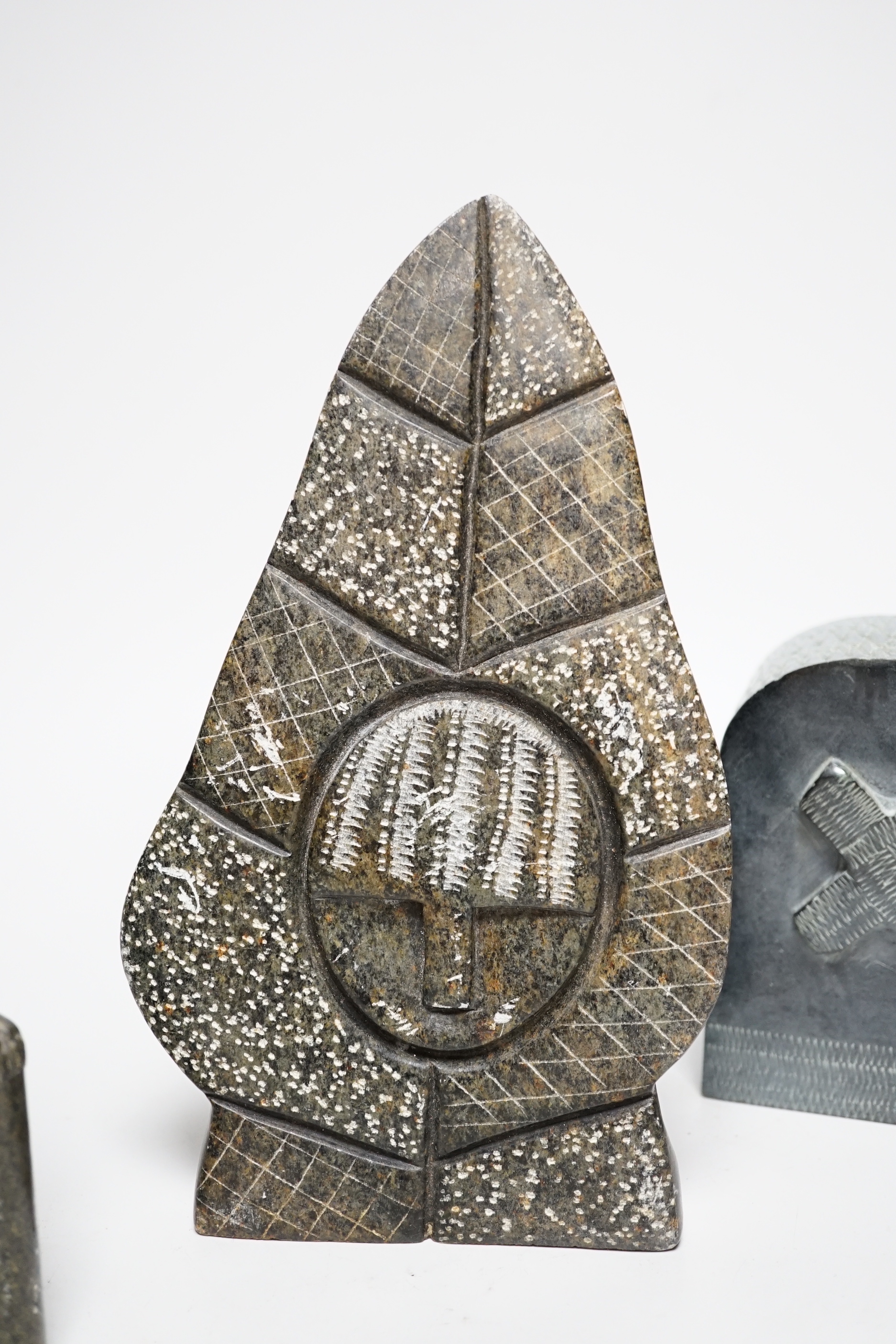 Three Eskimo Inuit soapstone carvings including a bird and fish, the largest 23cm high